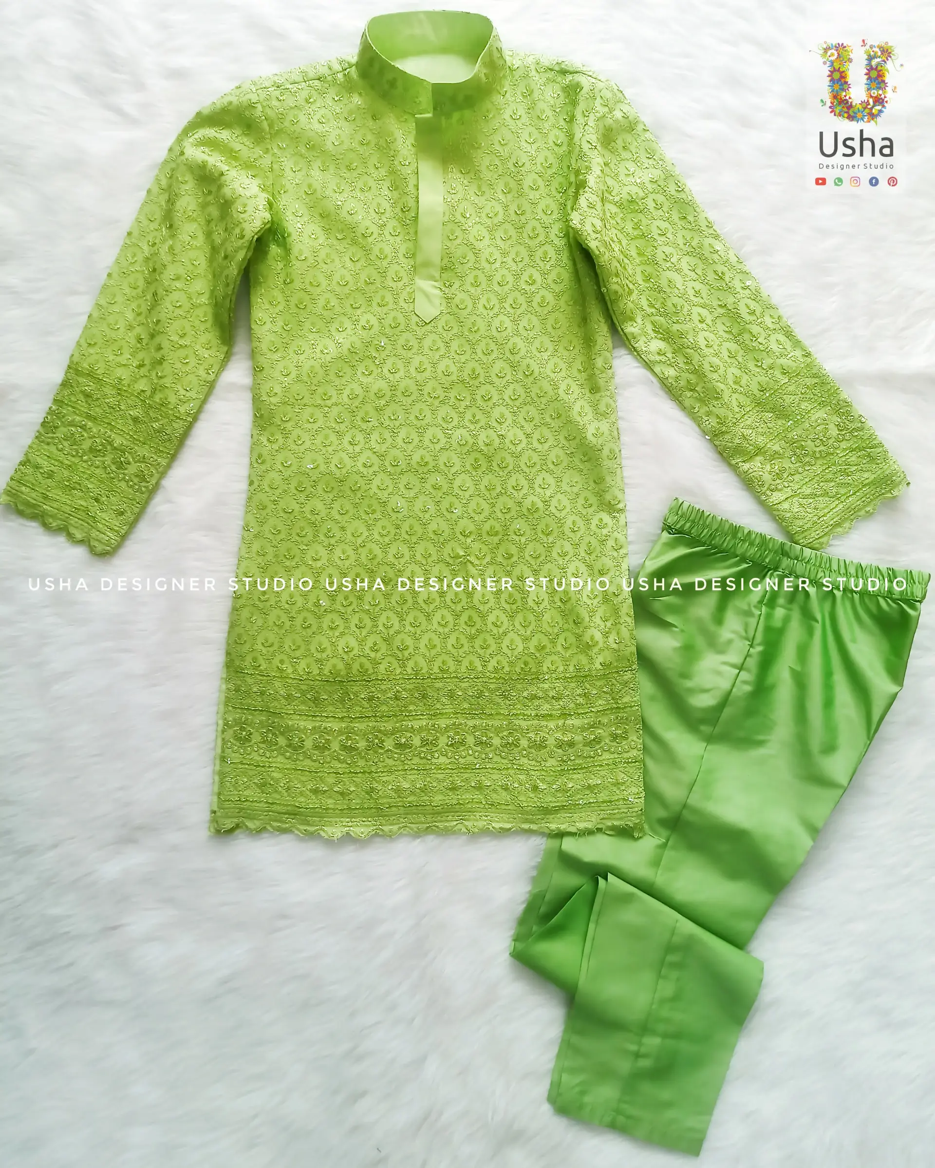 Tailor-made men’s parrot green Chikankari kurtha set by Usha Designer Studio, Vijayawada, featuring detailed hand embroidery on the kurtha and coordinating tailored pants for a contemporary ethnic look.