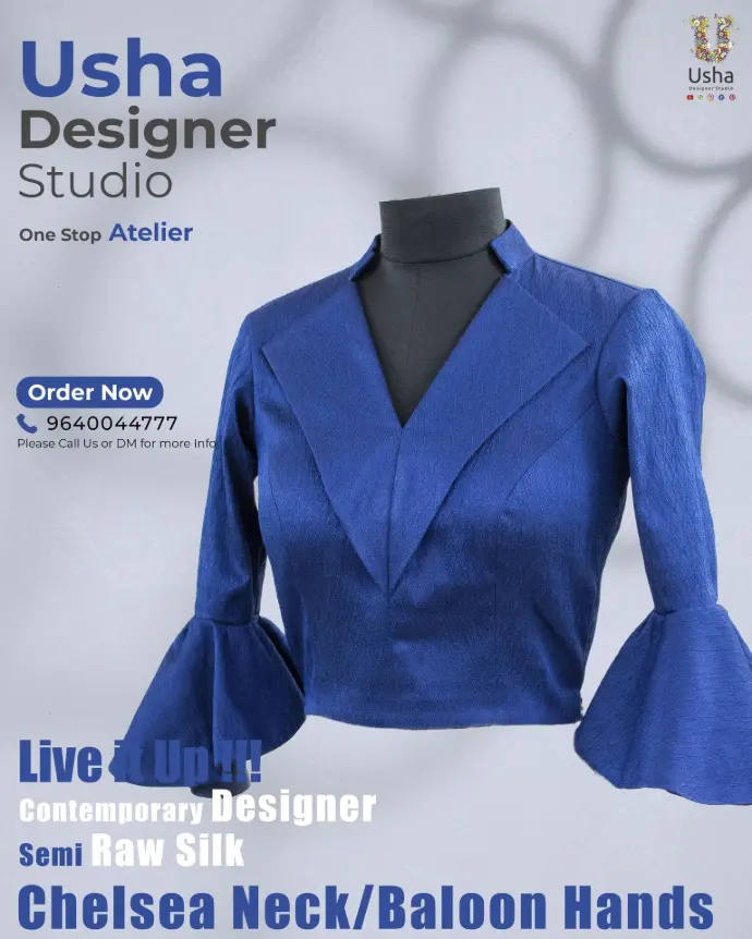 Elegant blue semi raw silk blouse with Chelsea neck and dramatic balloon sleeves, custom-designed by Usha Designer Studio for contemporary bespoke tailoring.