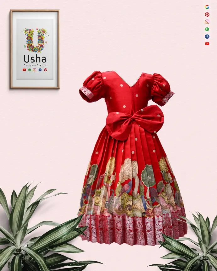 Red pure pattu silk mom and daughter matching long frocks with diamond and V-neck designs, gold butta weave, temple border, and pleated finish – Usha Designer Studio.