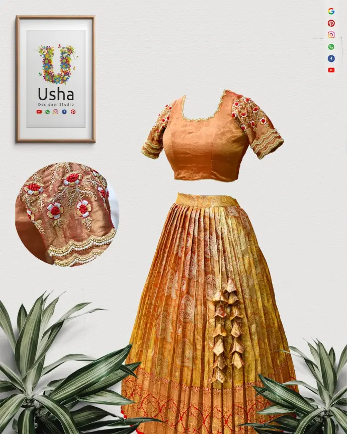 Peach-orange crop top lehenga made from saree with Aari floral embroidery blouse, scalloped U-neck, heavy pleated skirt, and handcrafted latkans by Usha Designer Studio, Vijayawada