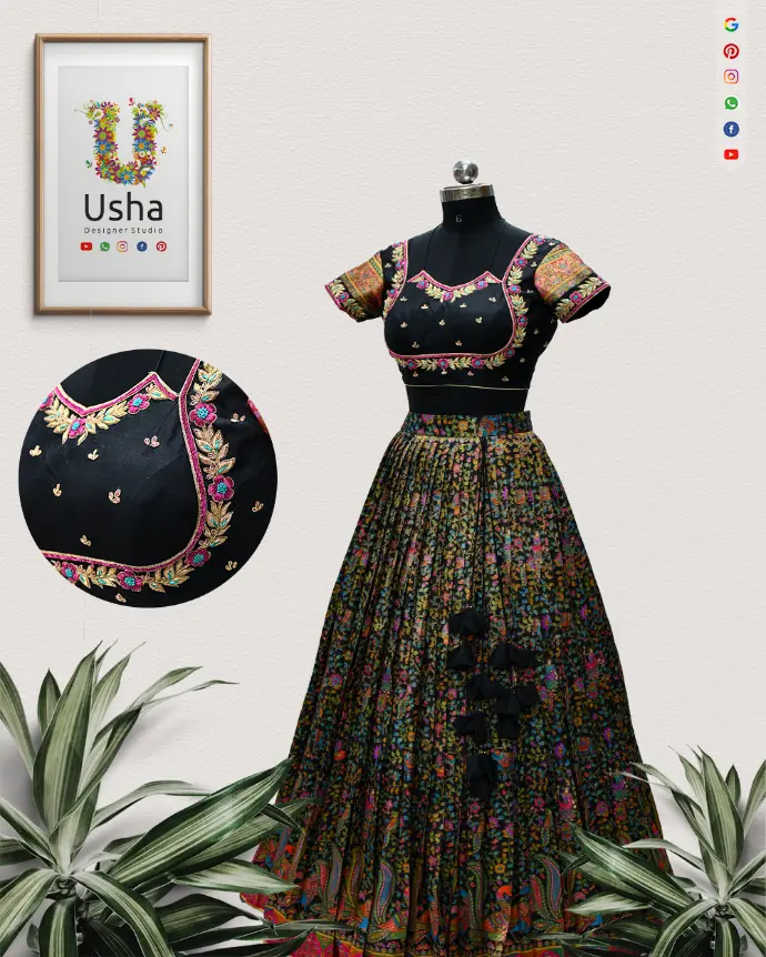 Tailor-made black Bhagalpuri silk crop top lehenga with intricate Aari embroidery, handcrafted latkans, and floral motifs by Usha Designer Studio, Vijayawada