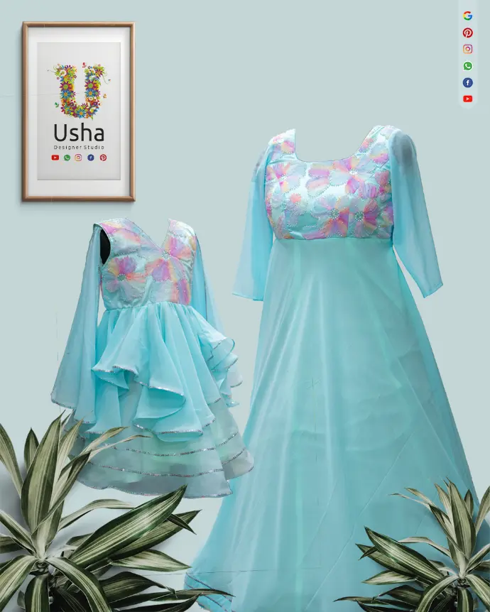 Sky blue mom and daughter matching frocks in georgette fabric with 3D floral embroidery, bead embellishments, and unique designer yokes by Usha Designer Studio, Vijayawada.