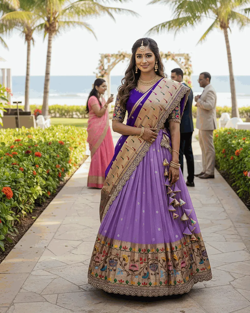 Purple Paithani crop top lehenga with Aari hand embroidery, scalloped U-neck, pleated lehenga, handcrafted latkans, and Maggam-edged Paithani dupatta by Usha Designer Studio, Vijayawada.