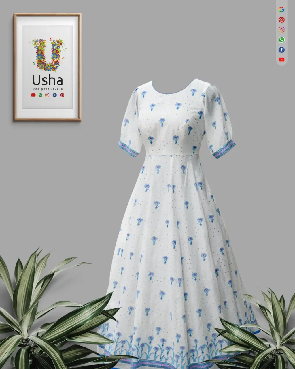 White pure cotton long frock with blue floral print, U-neck, puff hands, and flowing ghera. Upcycled from a saree by Usha Designer Studio