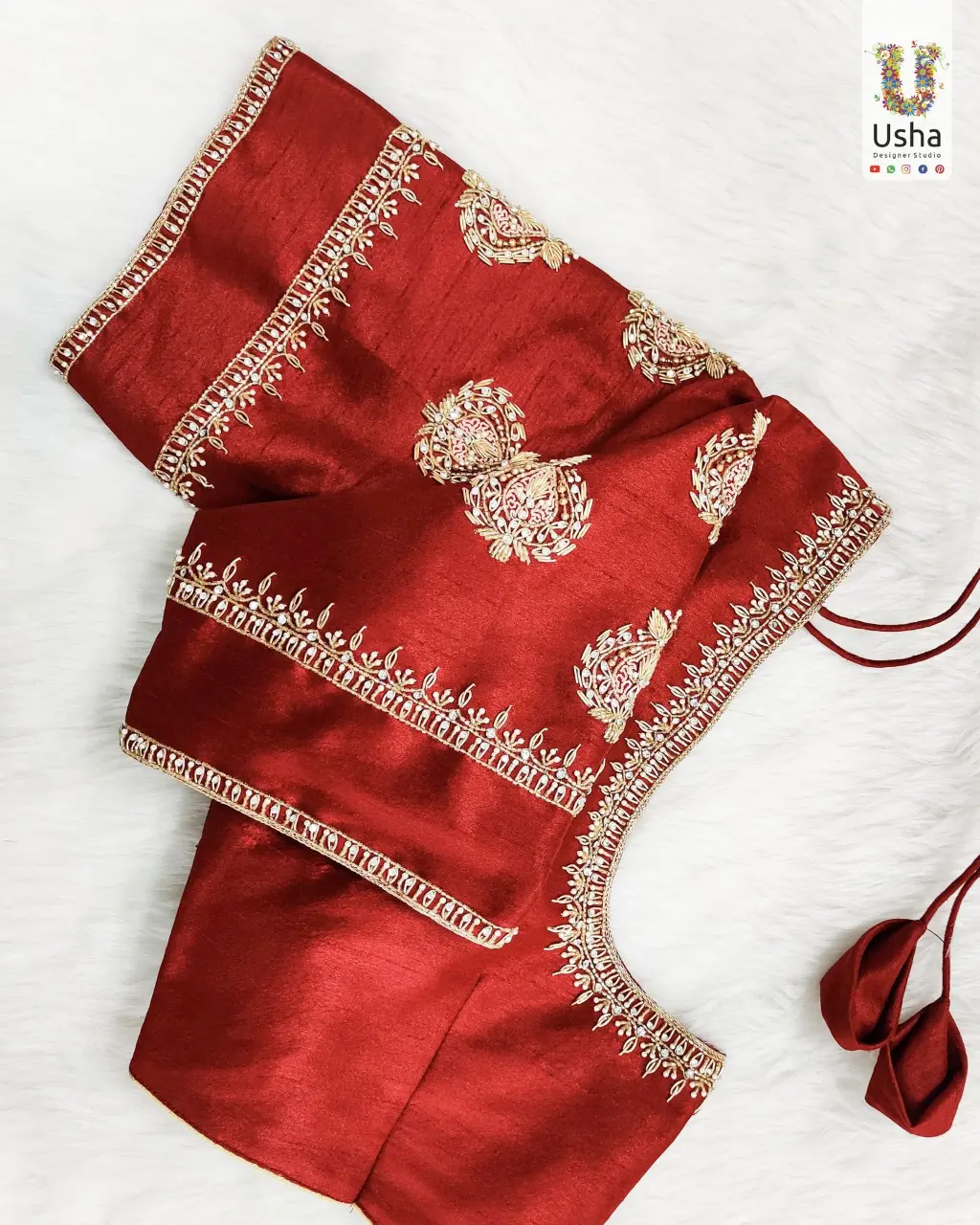 Pure Red Raw Silk Bridal Blouse with Intricate Maggam Work – Usha Designer Studio, Vijayawada Handcrafted pure red raw silk bridal blouse featuring intricate maggam and aari embroidery, by Usha Designer Studio, Vijayawada