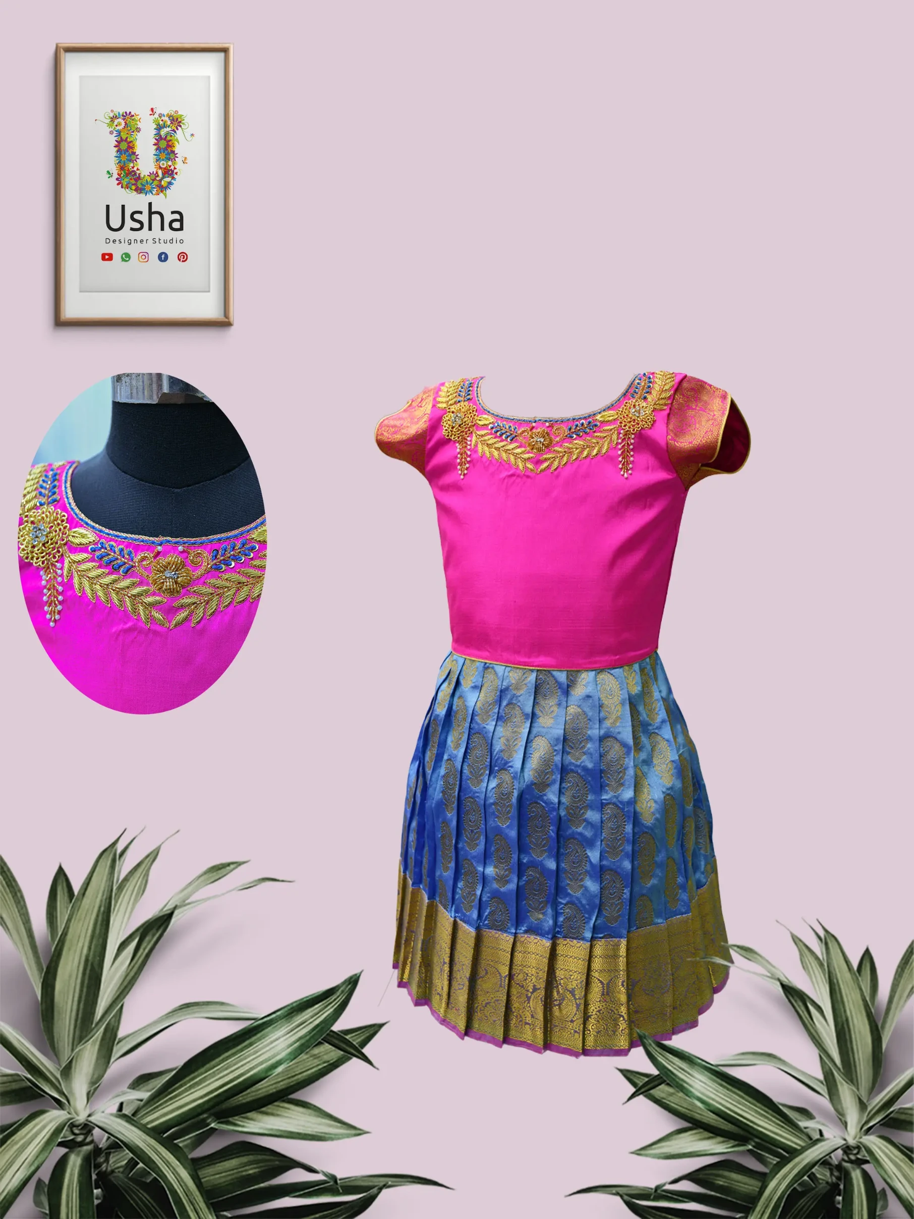 Traditional South Indian Pattu Gown for girls featuring a fuchsia pink raw silk top with gold Maggam embroidery and pearl drops, paired with a pleated sky blue Kanchipuram silk skirt with gold paisley motifs and broad border. Custom tailored by Usha Designer Studio, Vijayawada.