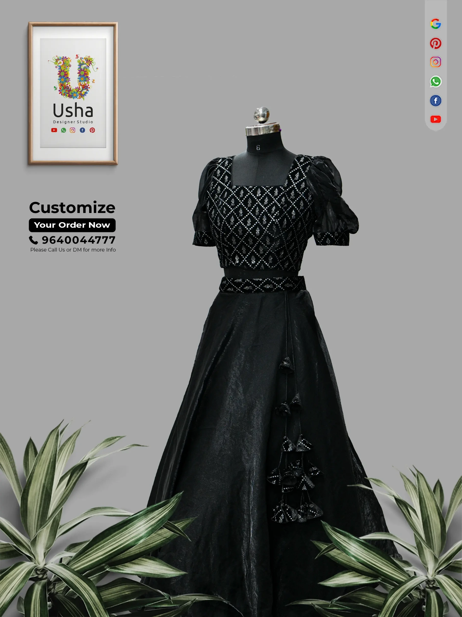 Woman posing in a vintage Indian home wearing a midnight black shimmer organza lehenga choli with silver geometric embroidery, sheer puff sleeves, and side tassels by Usha Designer Studio Vijayawada.